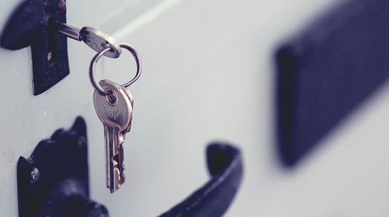 A safe with a key in it representing weak api authentication
